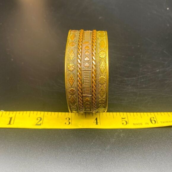 Ladies 8” brass bangle w/intricate engraving that appears to be Eastern Indian - Picture 8 of 10